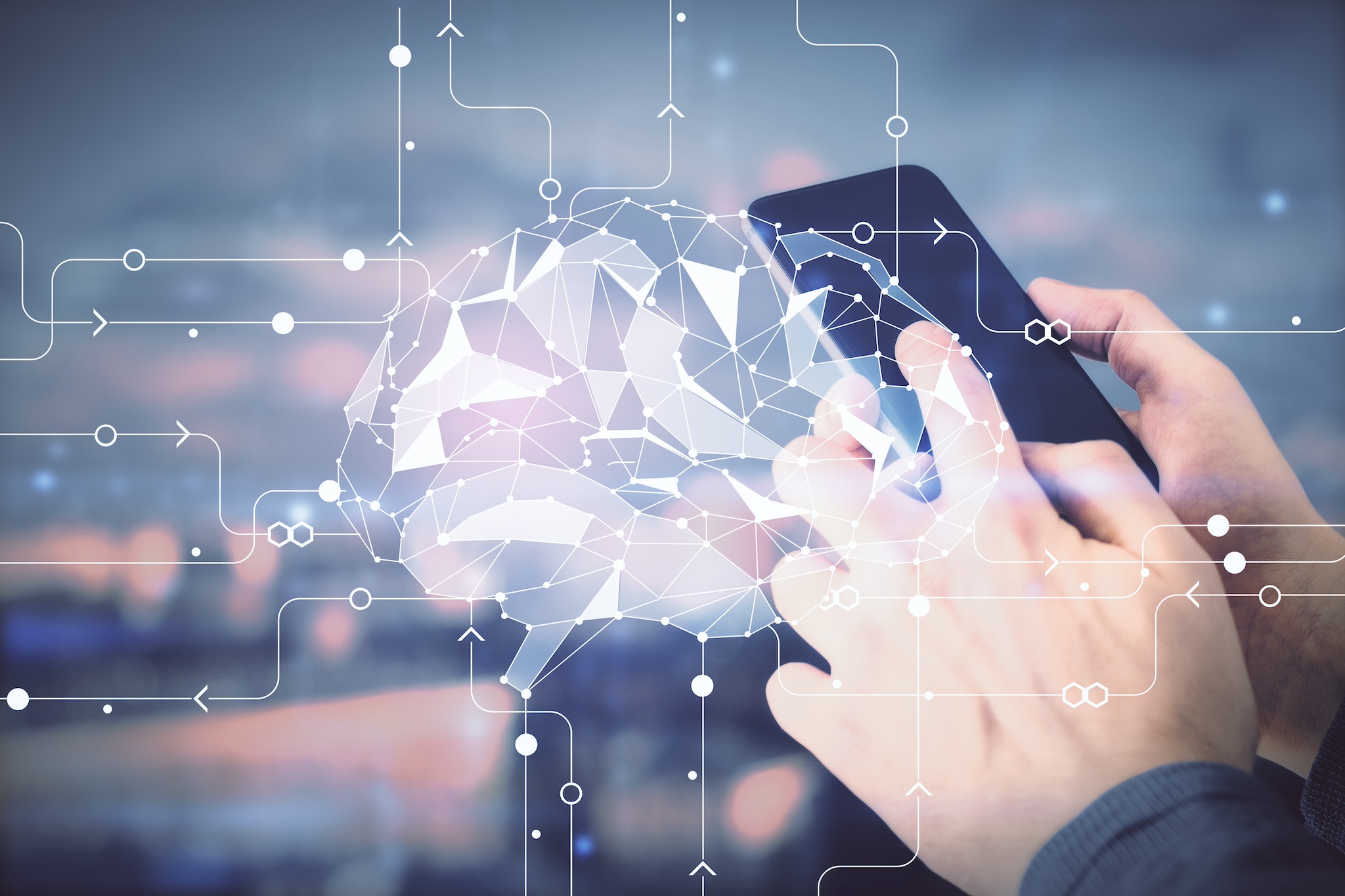 man's hand holding and using a digital device and brain hologram drawing